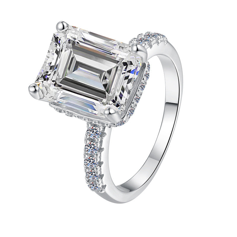 Damen Verlobungsring mit kunstvollem Zirkonia und elegantem Rahmen Shop Nory