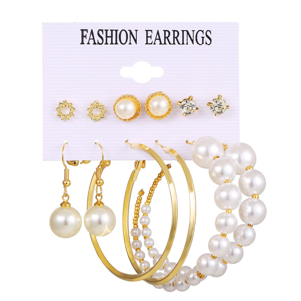Damen Ohrringe Set mit eleganten herzförmigen Anhängern und funkelnden Kristallen Shop Nory