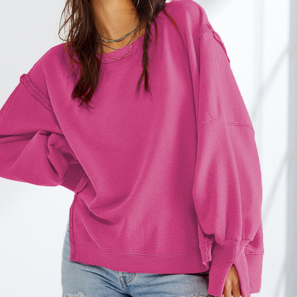 Damen Oversized Sweatshirt mit Ballonärmeln, seitlichen Schlitzen und offenen Kanten Shop Nory