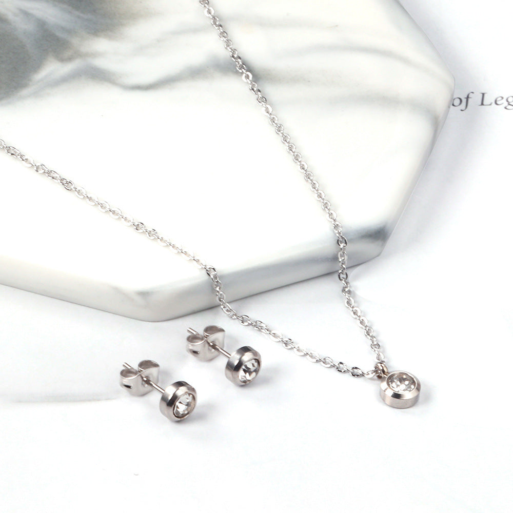 Damen Schmuckset mit Zirkon-Anhänger und dazu passenden Ohrsteckern Shop Nory