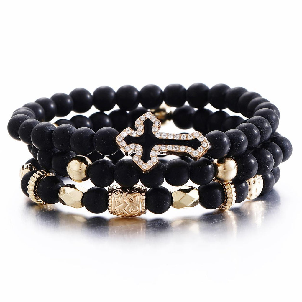 Damen Armreif-Set mit funkelndem Kreuzanhänger und einzigartigen Perlen Shop Nory
