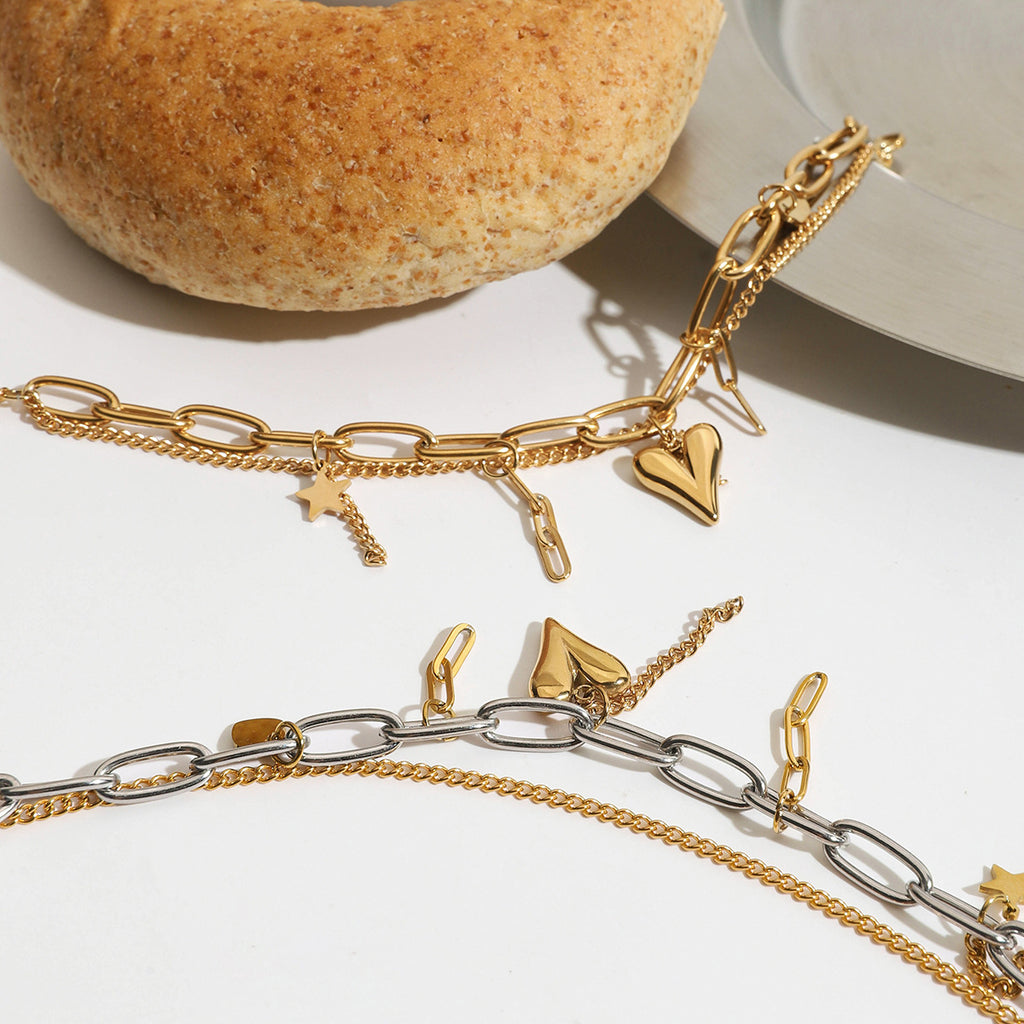 Damen Charm-Armband mit einzigartigen Symbolen und hygienischem Edelstahl Shop Nory
