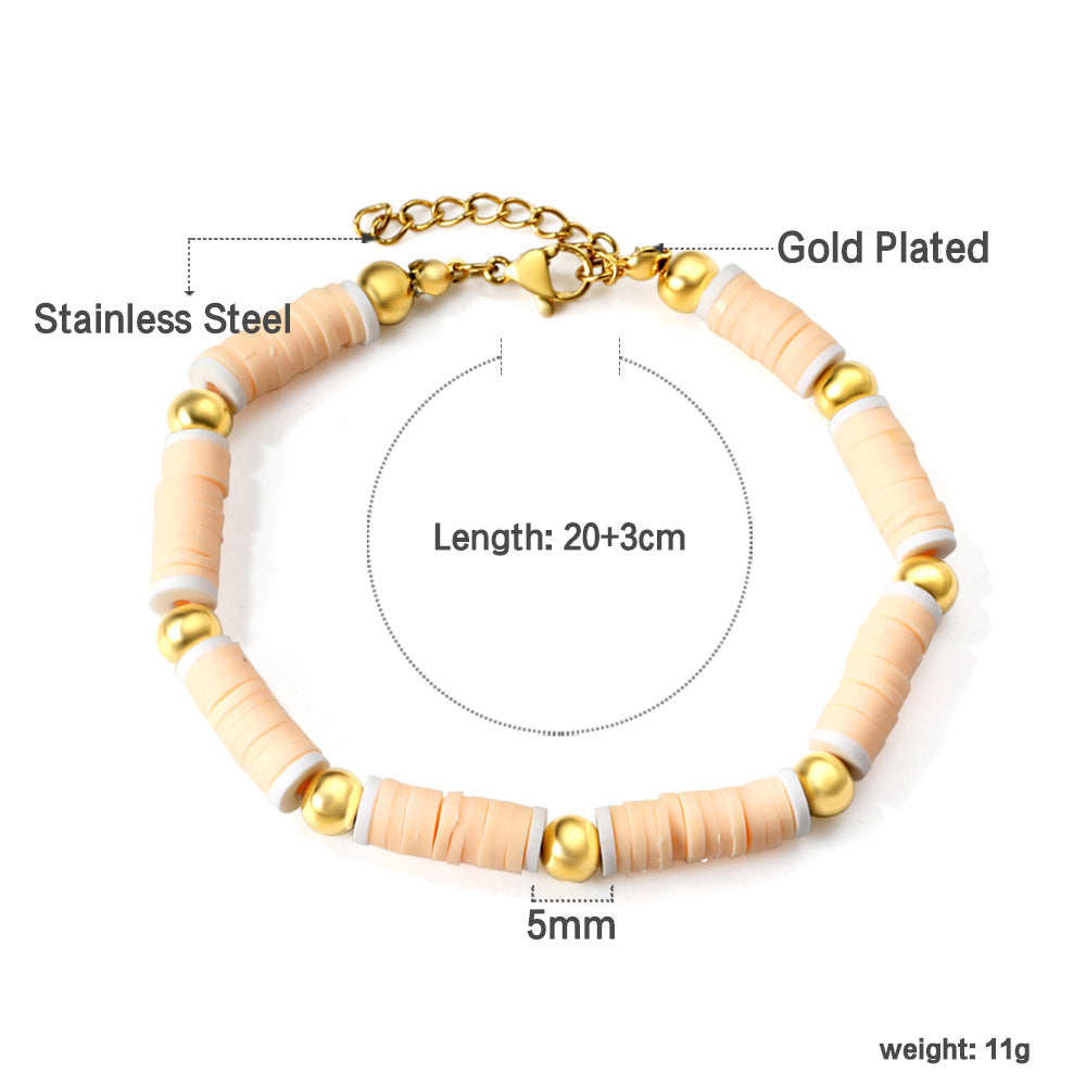 Damen Armband aus hochwertigem Edelstahl mit bunten Perlen und goldplattierten Akzenten Shop Nory