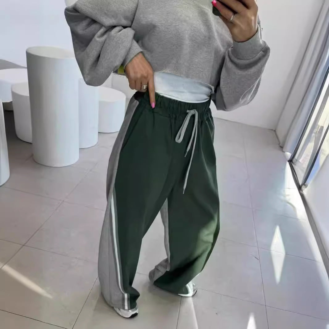 Herren Weite Trackpants mit kontrastierenden Seitenbahnen, hohem Bund und markantem Seitenstreifen Shop Nory