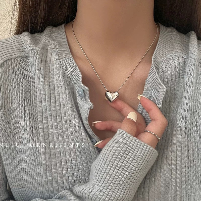 Damen Halskette mit herzförmigem Anhänger aus hochwertigem Edelstahl Shop Nory