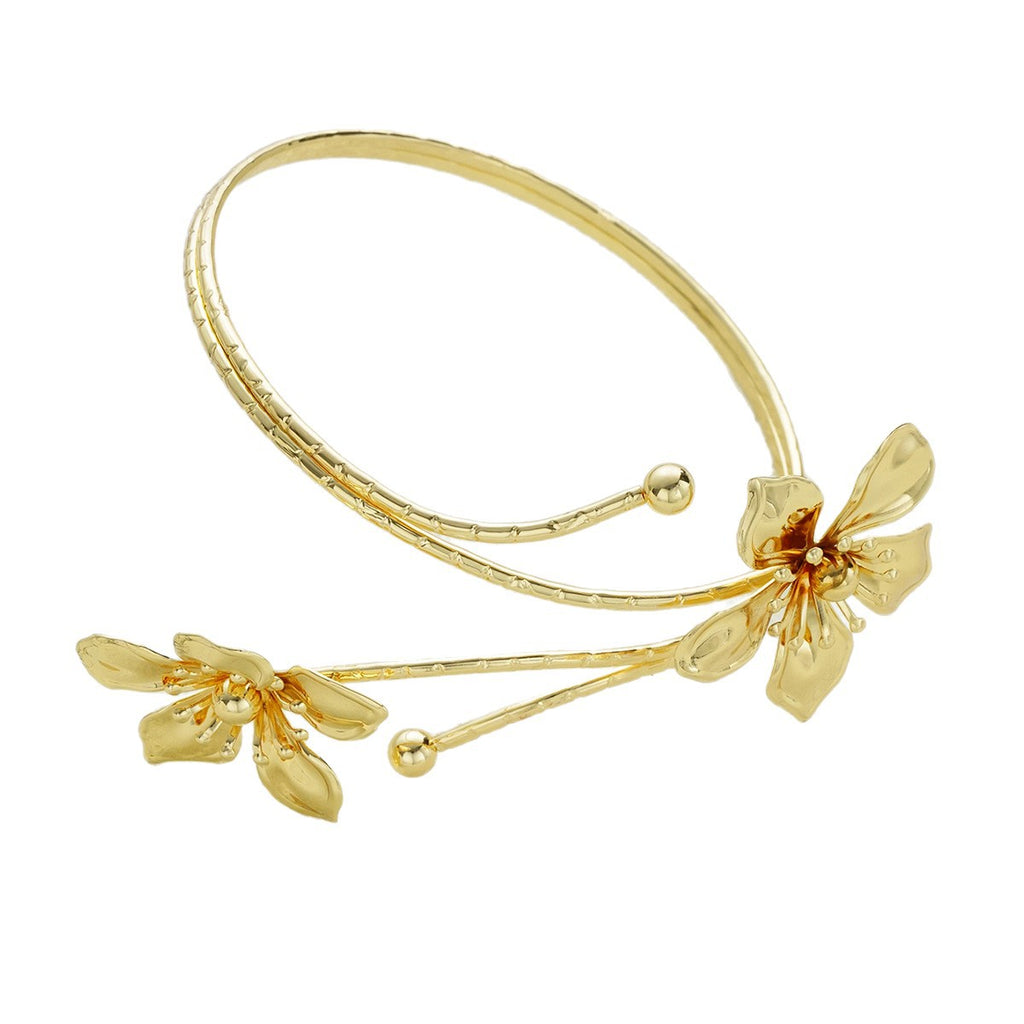 Damen Armreif mit floralem Design und glänzenden Details Shop Nory