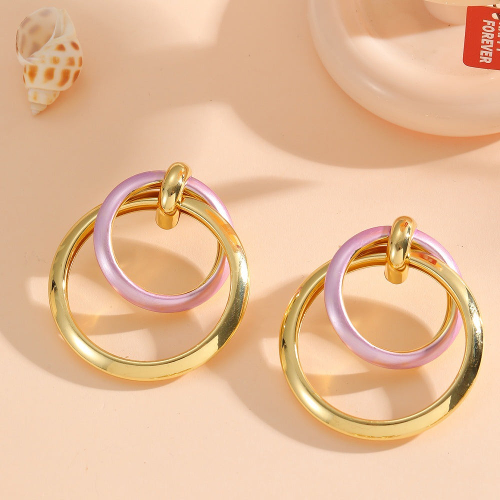 Damen Ohrringe mit elegantem, überlagertem Ringdesign Shop Nory