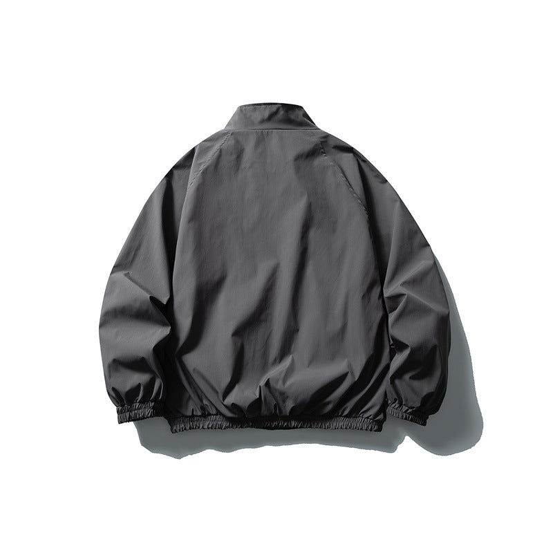 Unisex Leichte wasserabweisende Windjacke mit Stehkragen, Raglanärmeln und elastischem Saum Shop Nory