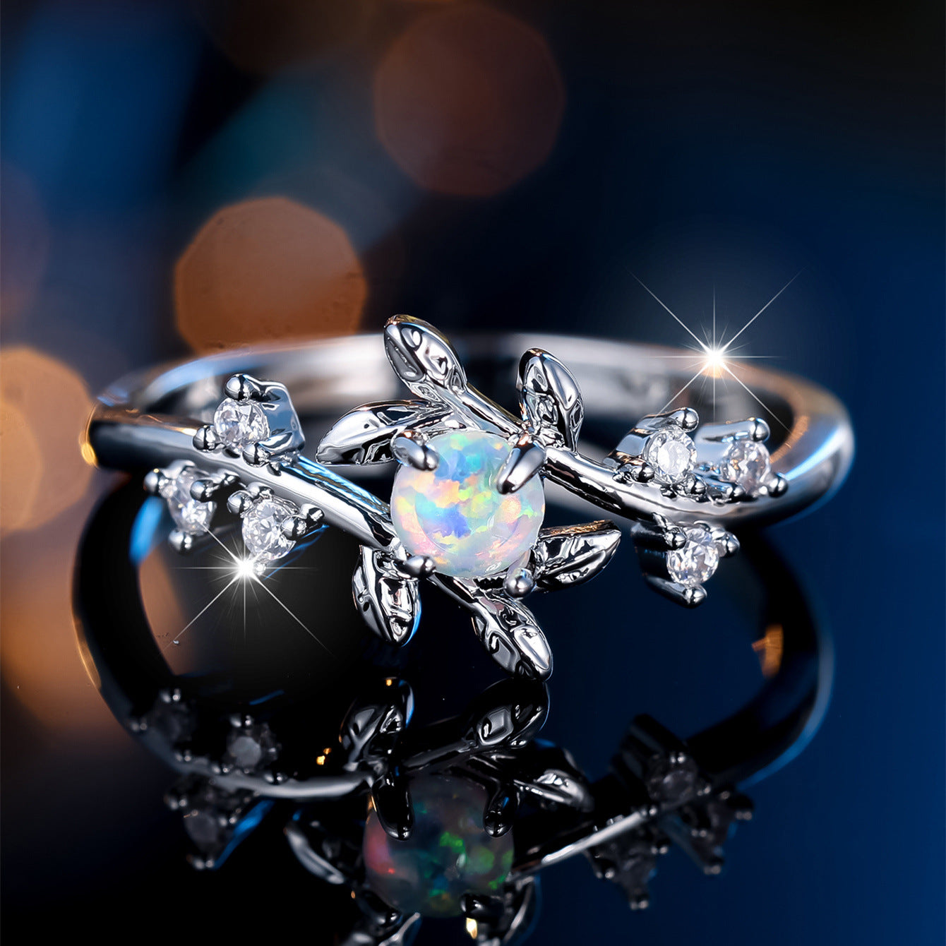 Damen Ring mit kunstvollem Blatt-Design und funkelndem Opal Shop Nory