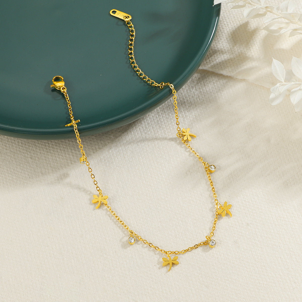 Damen Fußkette mit floralem Design und funkelnden Kristallen Shop Nory