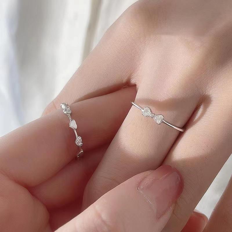Damenring mit kunstvollem Doppel-Design und funkelnden Zirkonia Shop Nory