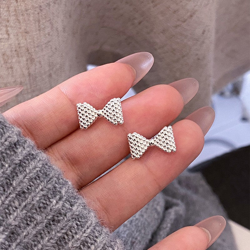Damen Ring im verspielten Schleifen-Design aus hochwertigen Perlen Shop Nory