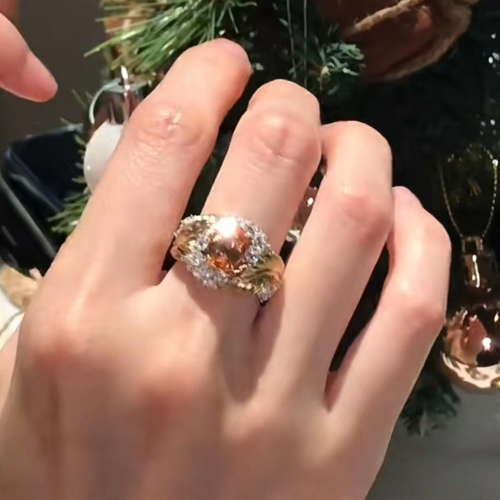 Damenring mit luxuriösem Design und funkelndem Edelsteinbesatz Shop Nory