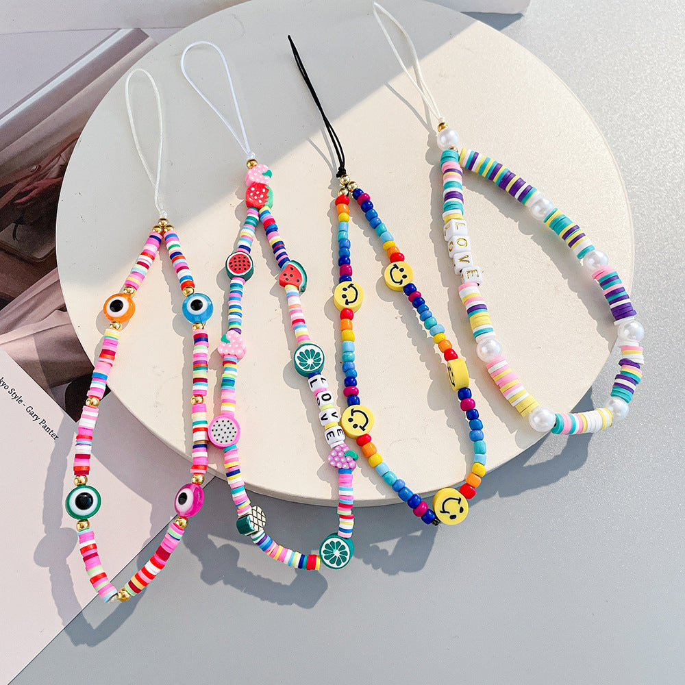 Damen farbenfrohe Schmuck-Halskette mit Smiley und Buchstabenanhängern Shop Nory
