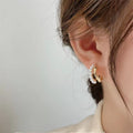 Damen Ohrstecker mit hochwertigen Perlen und modernem Design Shop Nory