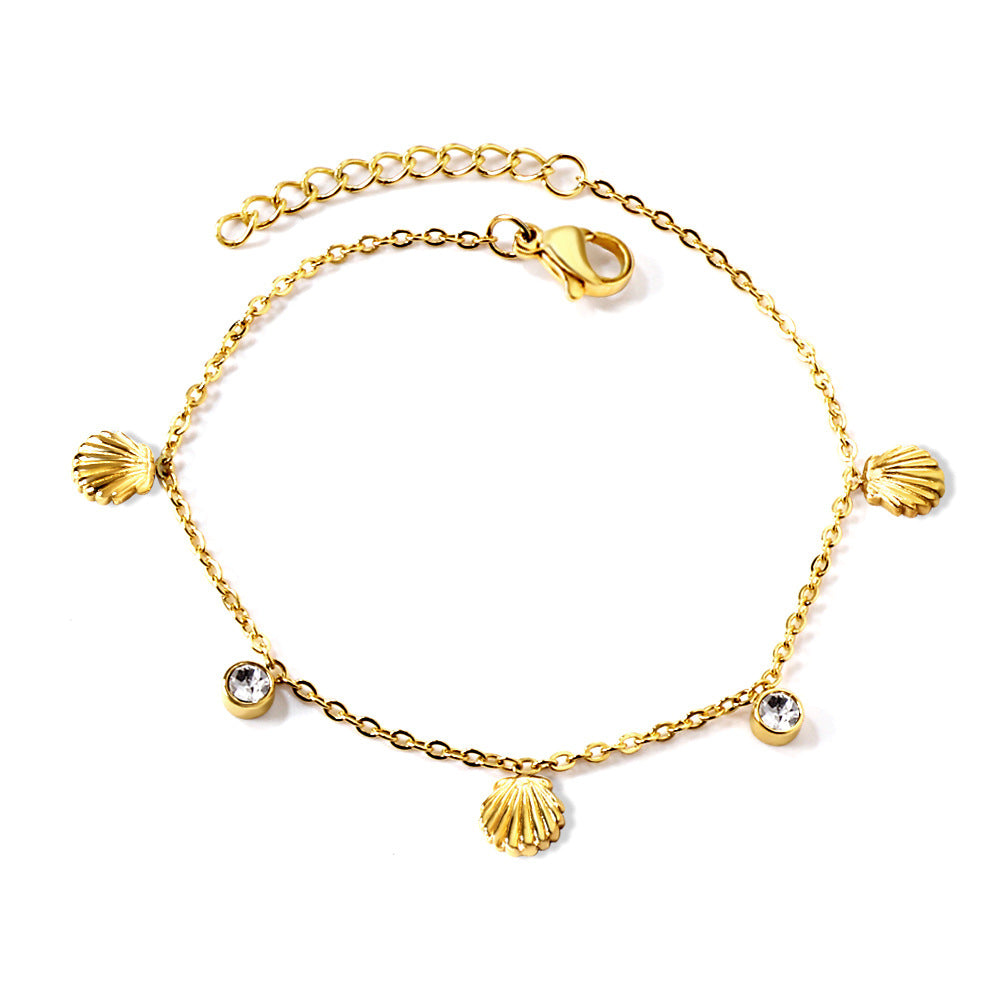 Damen zartes, goldplattiertes Armband mit funkelnden Zirkonia und herzförmigen Anhängern Shop Nory