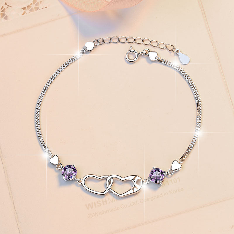 Damenarmband mit elegantem Herzdesign und funkelnden Zirkonia Shop Nory