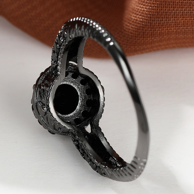 Damen Ring mit kunstvollem schwarzem Stein und filigraner Details Shop Nory