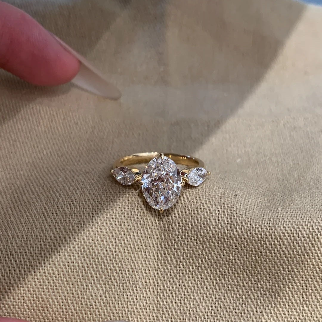 Damen Verlobungsring mit kunstvollem, ovalem Diamantdesign und funkelnden Zirkonia Shop Nory