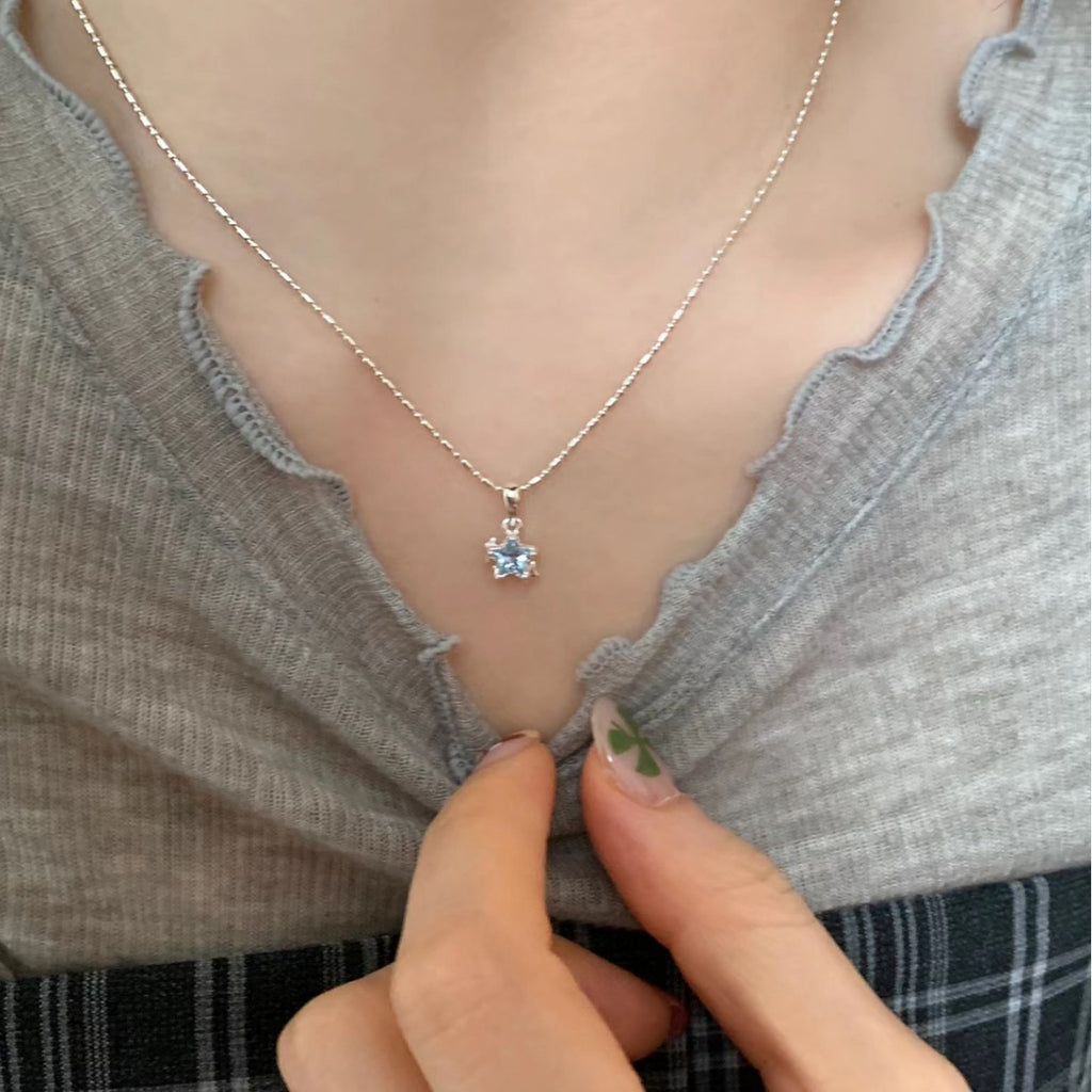 Damen Halskette mit funkelndem Sternanhänger und hochwertiger Silberkette Shop Nory