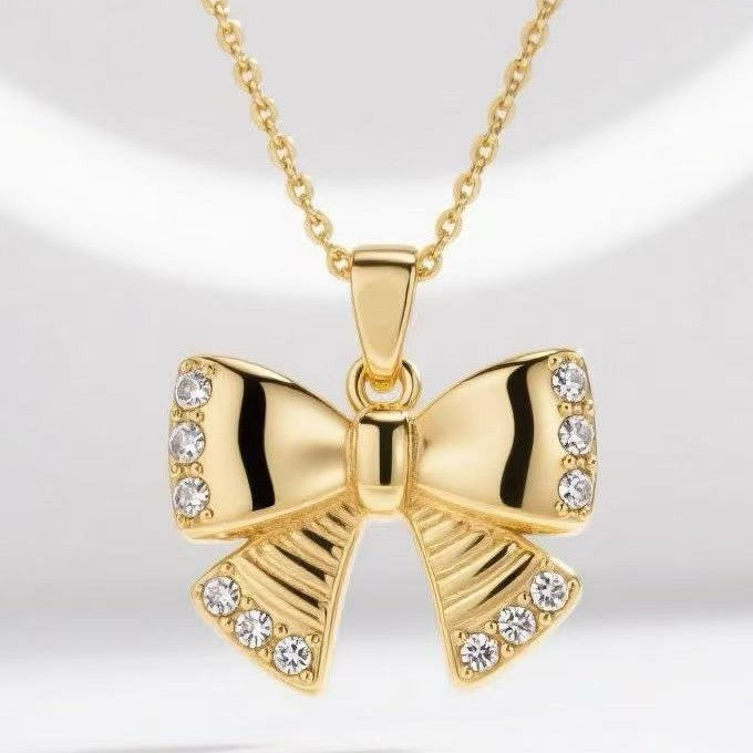 Damen Halskette mit elegantem Schleifen-Anhänger und funkelnden Zirkonia-Details Shop Nory
