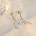 Damen Ohrringe mit elegantem Schleifen- und Perlen-Design Shop Nory