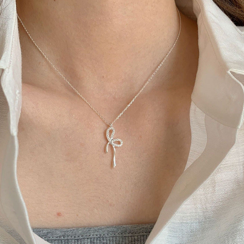 Damen Halskette mit elegantem Schleifenanhänger Shop Nory