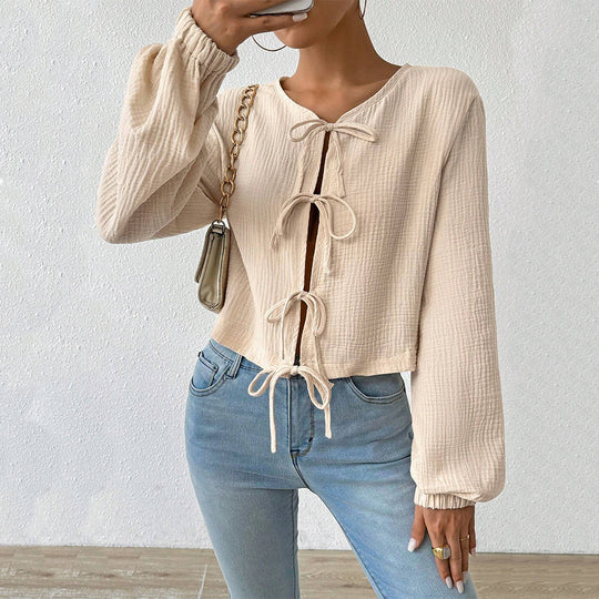 Damen kurz geschnittene Musselinbluse mit Knotenverschlüssen und Ballonärmeln Shop Nory