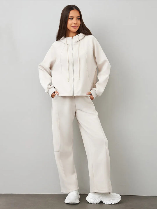 Damen Oversize-Zip-Hoodie mit Kängurutasche und hochgeschnittener Sweathose mit weiter Beinführung Set Shop Nory