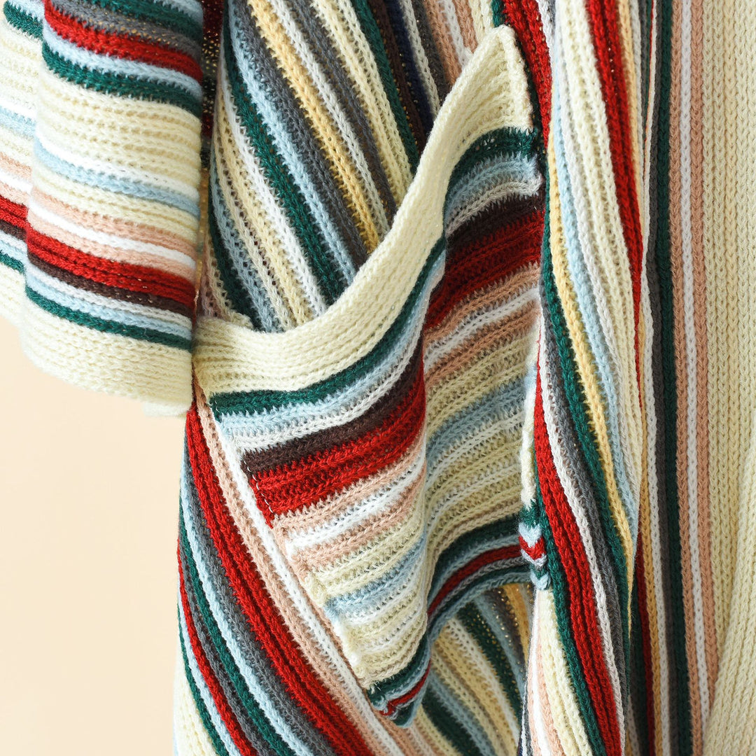 Damen Gestreifter Strickponcho mit Fransen und Eingrifftaschen Shop Nory