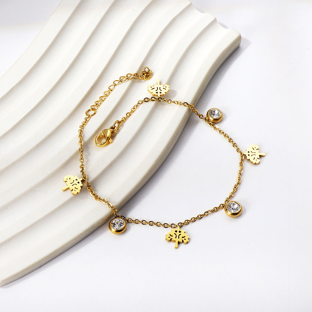 Damen Armband mit funkelnden Zirkonia und handgefertigten Anhängern Shop Nory