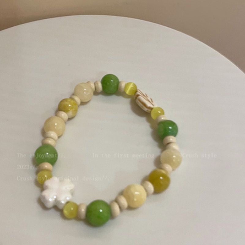 Damen Armband aus handgefertigten Natursteinen mit charmanten Tiermotiven Shop Nory