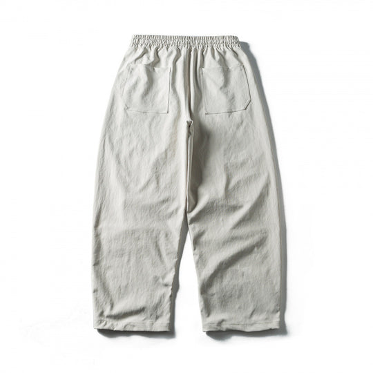 Unisex Weite Cropped-Hose mit Tunnelzug, elastischem Bund und markanten Nahtpaneelen Shop Nory