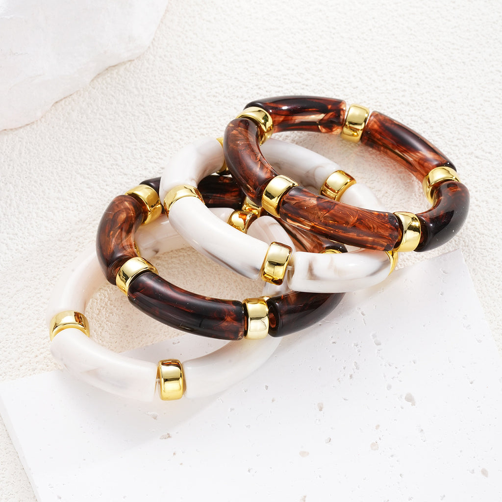 Damen Armreif-Set mit luxuriösen Acrylelementen und goldenen Akzenten Shop Nory