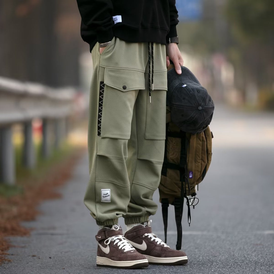 Herren weite Cargo-Jogginghose mit Kordelzug Klapptaschen und elastischen Bündchen Shop Nory