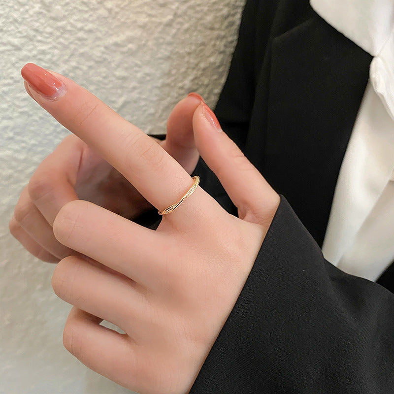 Damen Offener Ring mit elegantem Wellendesign und funkelnden Zirkonia Shop Nory