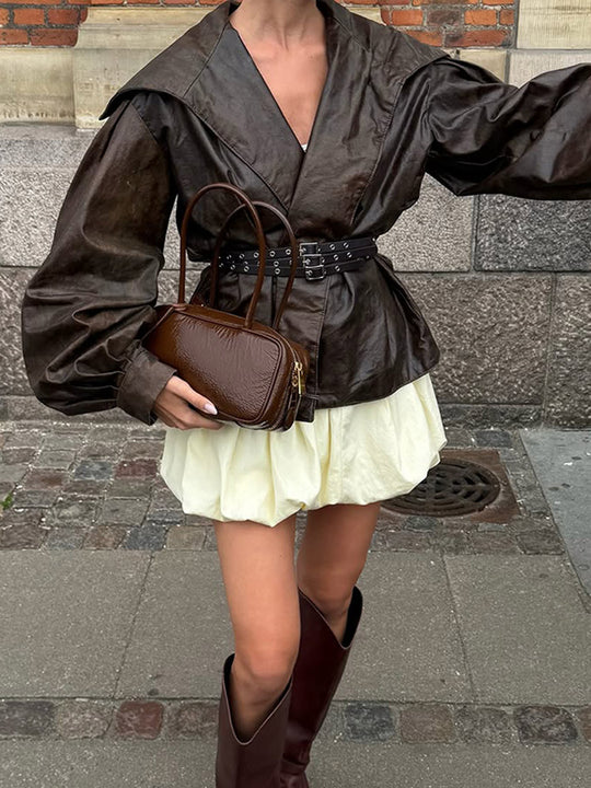 Damen Taillierter Lederimitat-Blouson mit weitem Schalkragen, voluminösen Ballonärmeln und doppeltem Nietengürtel Shop Nory