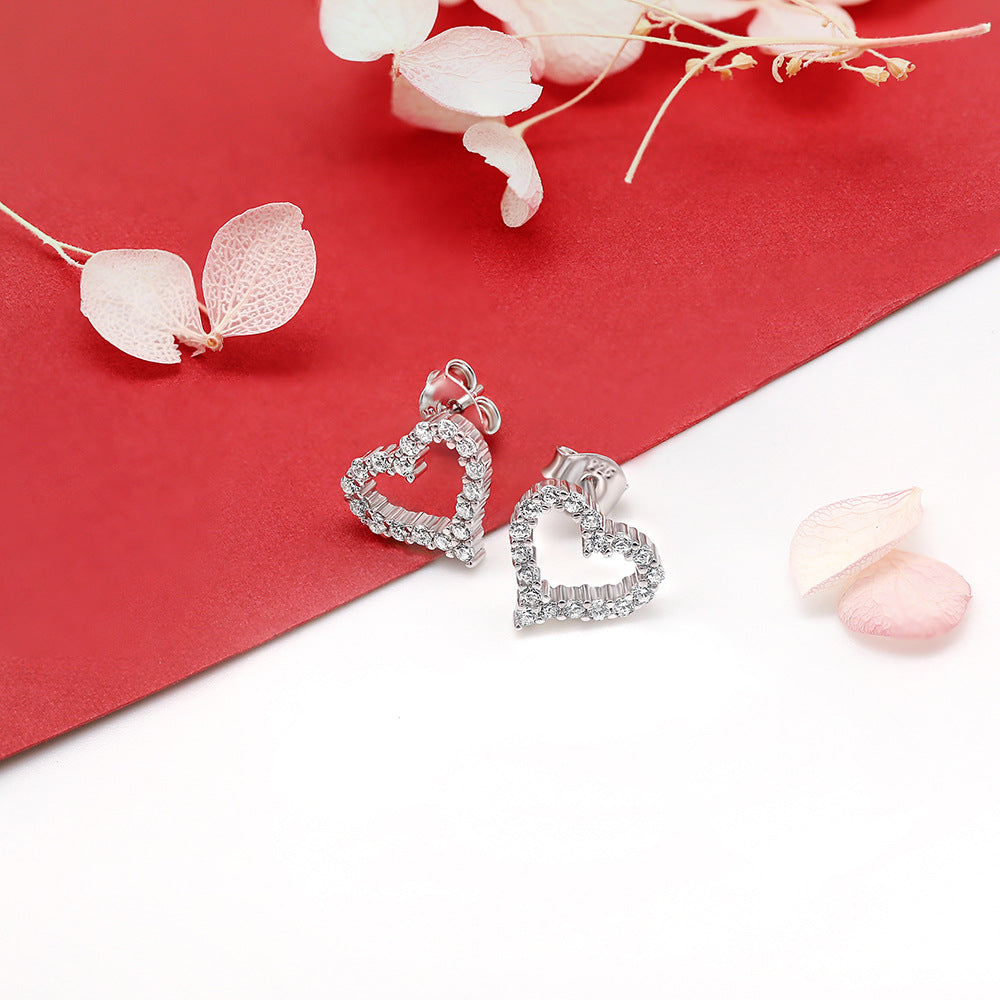 Damen Ohrringe im Herzdesign mit glitzerndem Zirkonia-Besatz Shop Nory
