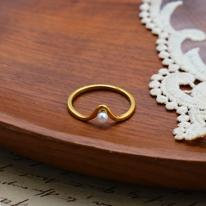 Damenring mit elegantem Design und Perle Shop Nory