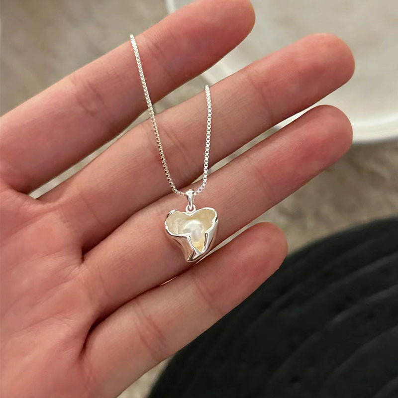 Damen Halskette mit herzförmigem Anhänger aus hochwertigem Silber und elegantem Design Shop Nory