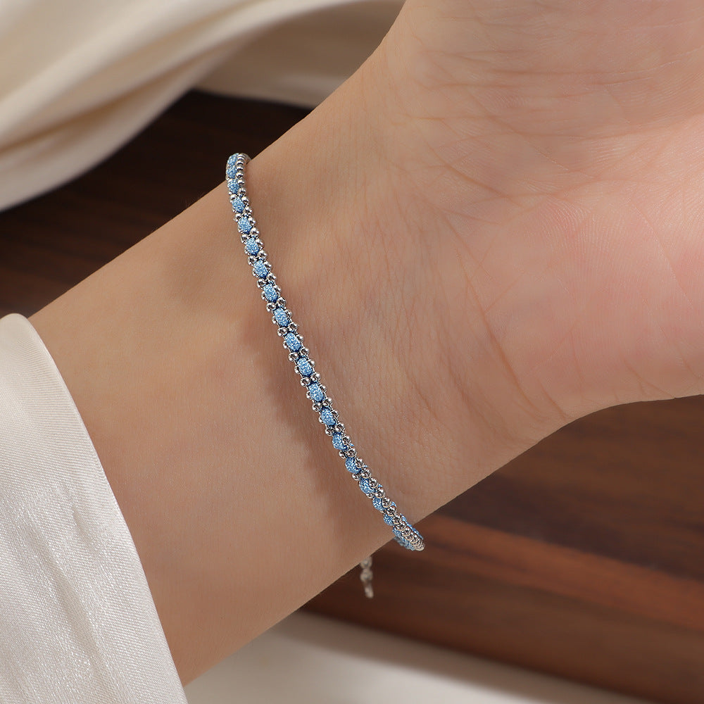 Damen romantisches Armband mit funkelnden roten Zirkonia Shop Nory