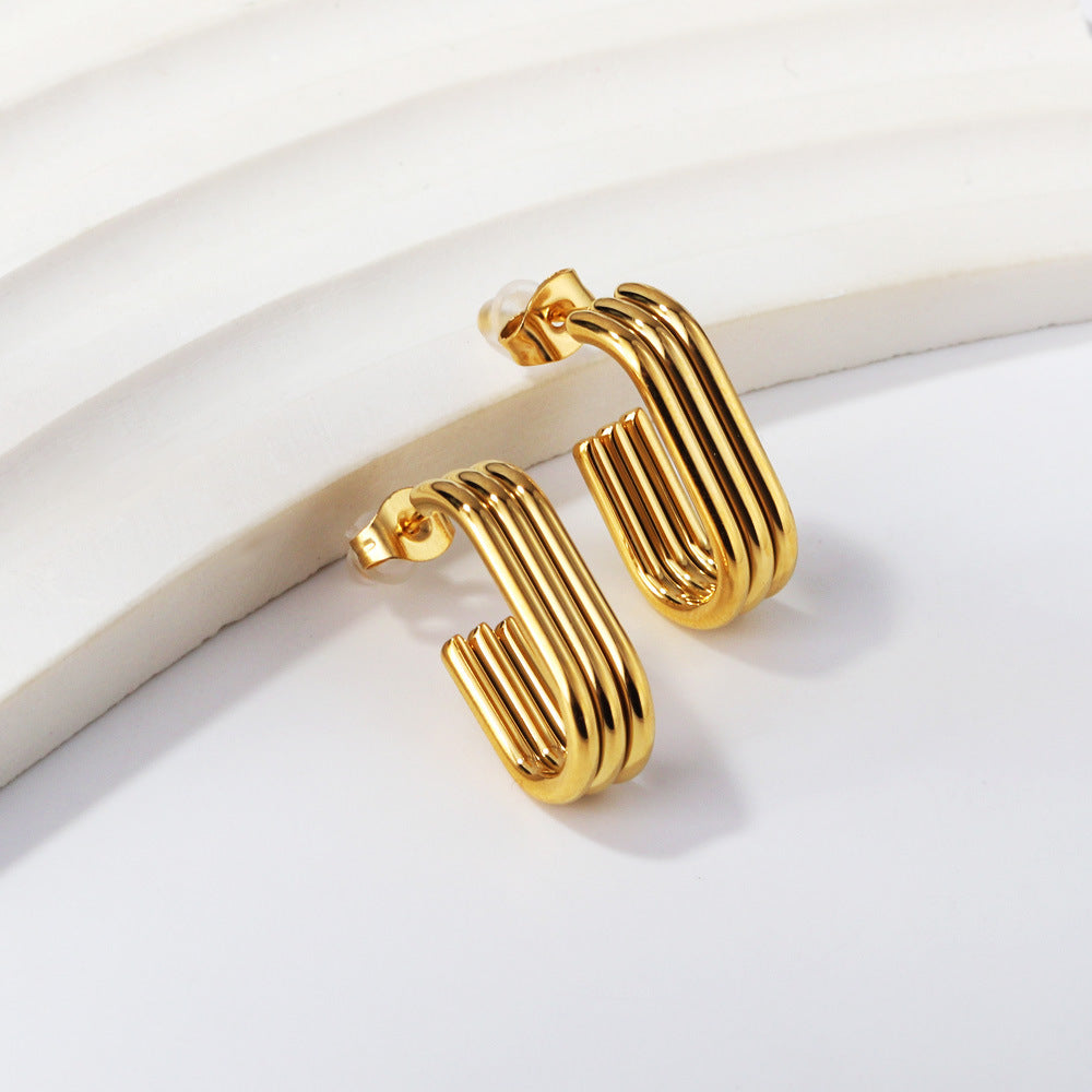 Damen moderne Ohrstecker mit elegantem, geschwungenem Design Shop Nory