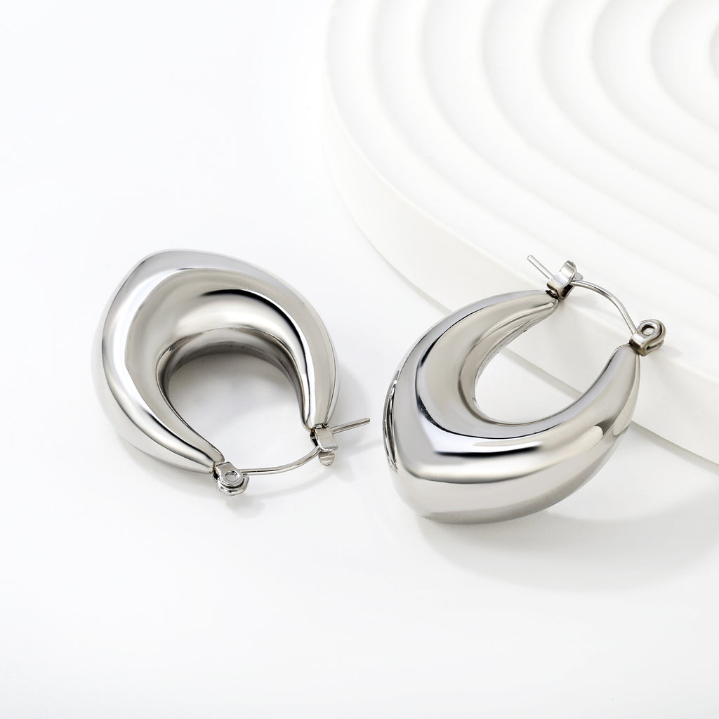 Damen Ohrringe mit modernem geschwungenem Design Shop Nory