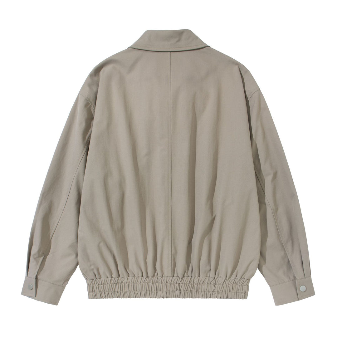 Unisex Kurz geschnittene Boxy-Blousonjacke mit Hemdkragen, verdecktem Reißverschluss und gerafftem Saum Shop Nory