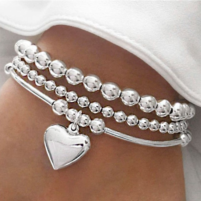 Damen Armband-Set mit funkelnden Perlen und eleganten Details Shop Nory