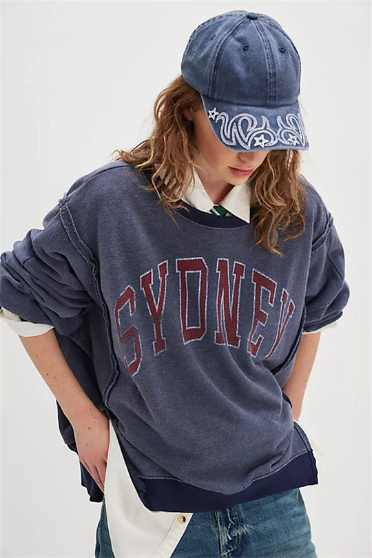 Damen oversized Sweatshirt mit Rüben-Print, ausgefransten Nahtakzenten und Daumenlochärmeln Shop Nory
