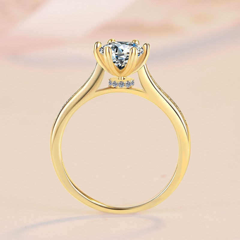 Damen Verlobungsring mit funkelndem rundem Zirkonia und luxuriösem Goldrahmen Shop Nory