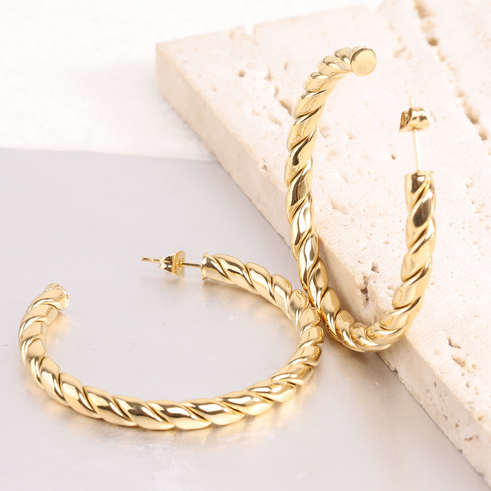 Damen Creolen mit gedrehtem Design und elegantem Finish Shop Nory