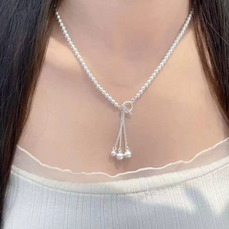 Damen Halskette mit eleganten Perlen und schimmerndem Anhänger Shop Nory