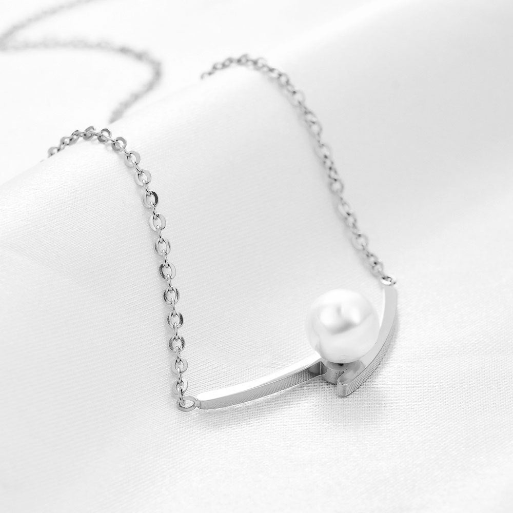 Damen Halskette mit elegantem Perlenanhänger und modernem Edelstahl-Design Shop Nory